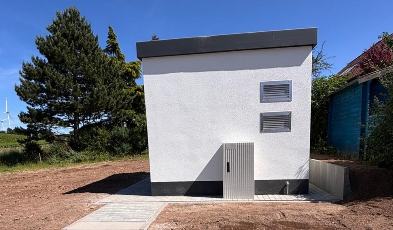 Auf dem Foto ist ein PoP-Gebäude zu sehen.